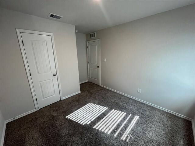 7302 Wilder Ln, Corpus Christi, TX 78414 - unfurnished bedroom featuring carpet floors and baseboards