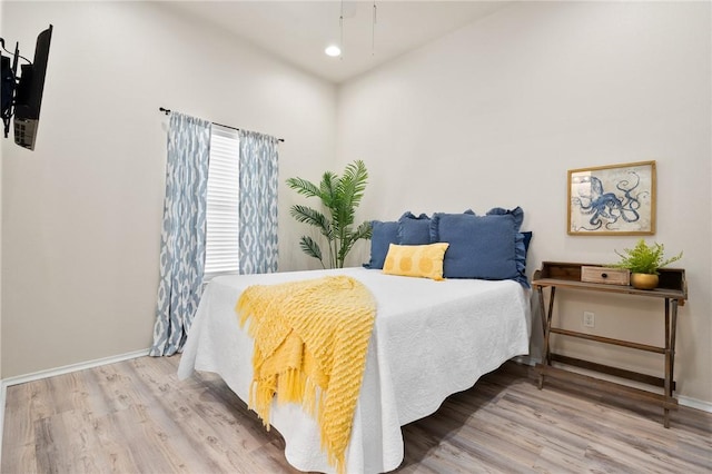 115 N Nautica, Rockport, TX 78382 - bedroom featuring wood finished floors and baseboards