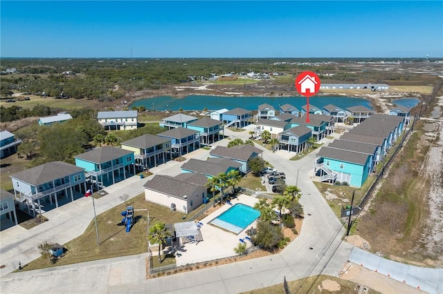 115 N Nautica, Rockport, TX 78382 - aerial view of residential area with a nearby body of water and a pool area
