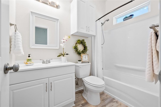 115 N Nautica, Rockport, TX 78382 - bathroom with toilet, shower / tub combo, vanity, and wood finished floors