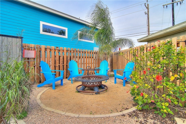 view of patio / terrace featuring a fire pit