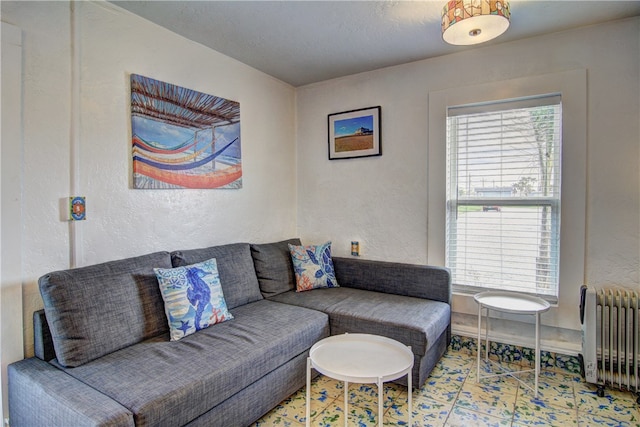 living room featuring radiator