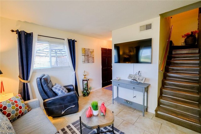 living room featuring light tile patterned floors