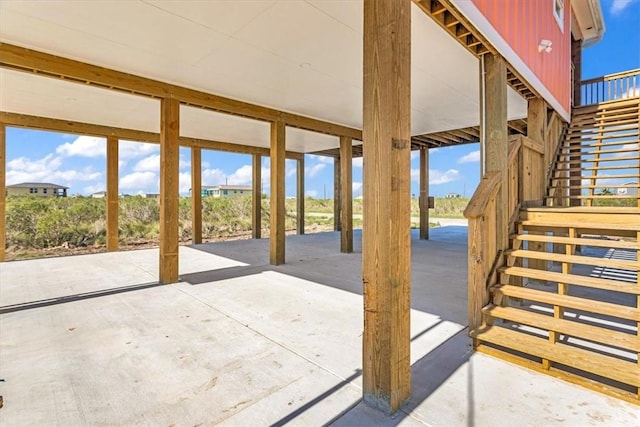 view of patio featuring stairway