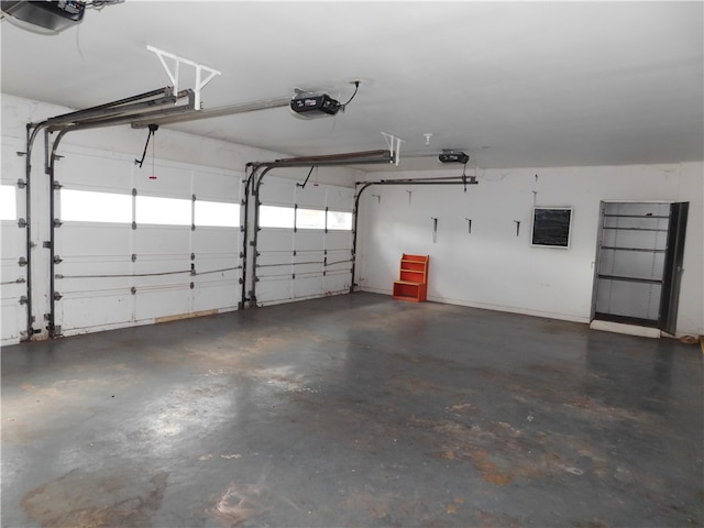 garage featuring a garage door opener