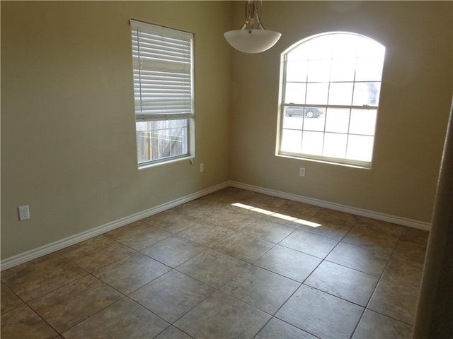 view of tiled spare room