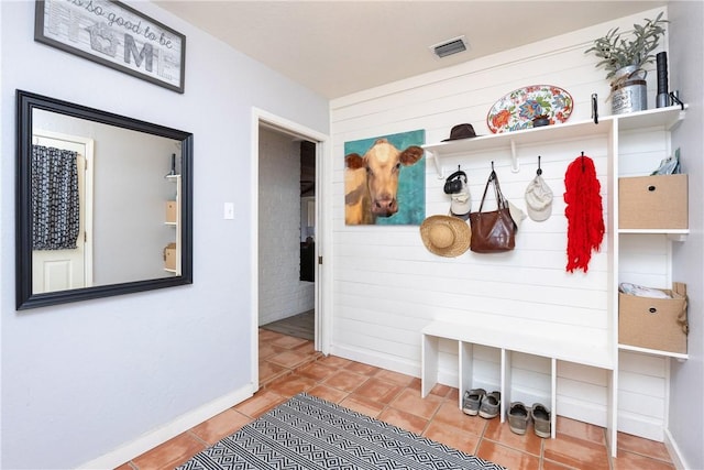 mudroom with tile patterned flooring