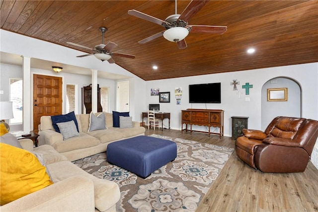 living room with wood-type flooring, lofted ceiling, ceiling fan, and wood ceiling