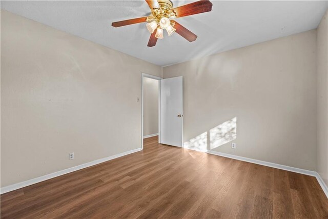 1301 Easthaven Dr, Corpus Christi, TX 78412 - empty room featuring baseboards, wood finished floors, and ceiling fan