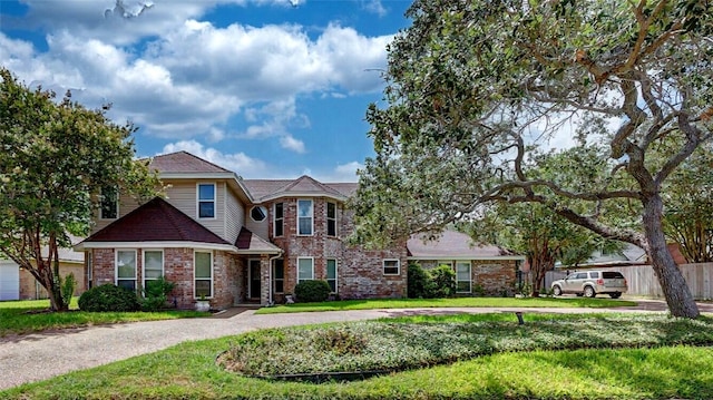7506 Bistineau Dr, Corpus Christi, TX 78413 - view of front facade with brick siding and curved driveway