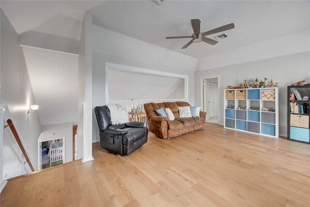 7506 Bistineau Dr, Corpus Christi, TX 78413 - living area with an upstairs landing, a ceiling fan, wood finished floors, and vaulted ceiling