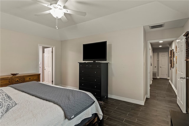 bedroom featuring dark wood-type flooring and ceiling fan