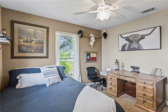 carpeted bedroom featuring ceiling fan