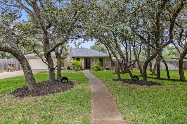 ranch-style home featuring a front yard