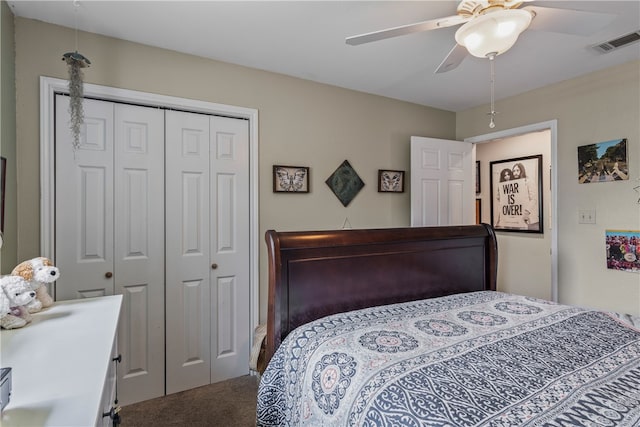 bedroom featuring ceiling fan, a closet, and carpet