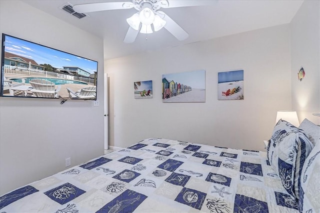 bedroom featuring visible vents and ceiling fan