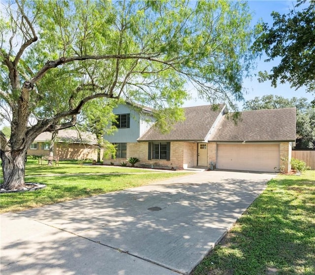 607 E 11th St, Bishop, TX 78343 - traditional-style house featuring brick siding, concrete driveway, a garage, and a shingled roof