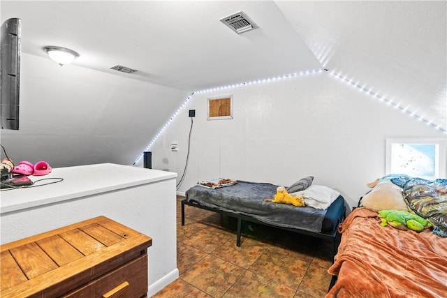 607 E 11th St, Bishop, TX 78343 - tiled bedroom with vaulted ceiling