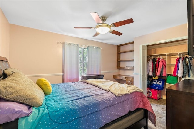 607 E 11th St, Bishop, TX 78343 - bedroom with a closet, wood finished floors, and a ceiling fan