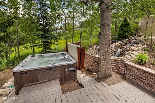 2010 Vermont Rd E, Vail, CO 81657 - wooden terrace featuring a hot tub and view of scattered trees