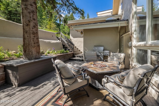 2010 Vermont Rd E, Vail, CO 81657 - view of patio with a fire pit, stairway, area for grilling, and a wooden deck