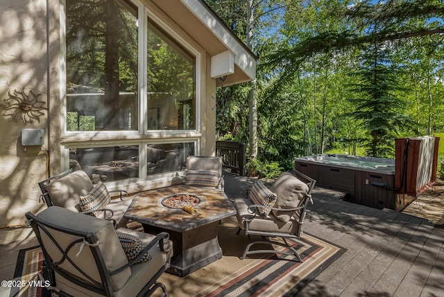 2010 Vermont Rd E, Vail, CO 81657 - wooden deck with a fire pit and a hot tub