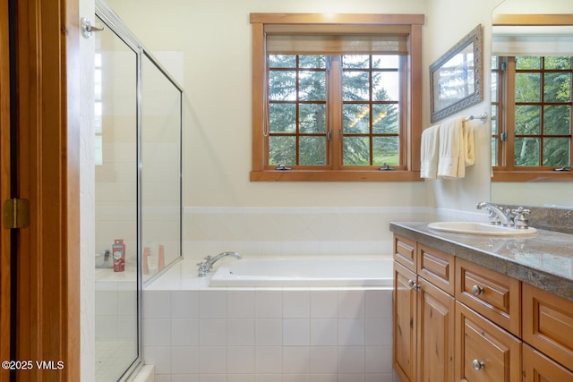 111 Club Cottage Dr, Edwards, CO 81632 - full bath featuring a garden tub, a shower stall, and vanity