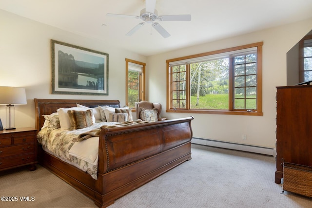 111 Club Cottage Dr, Edwards, CO 81632 - bedroom with a baseboard heating unit, light colored carpet, and ceiling fan