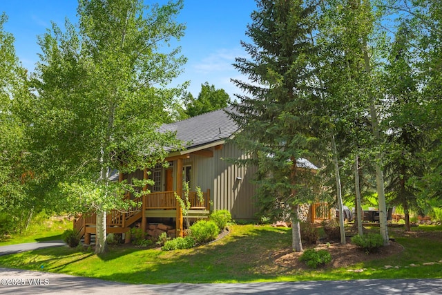 111 Club Cottage Dr, Edwards, CO 81632 - view of front facade with a front lawn and stairway