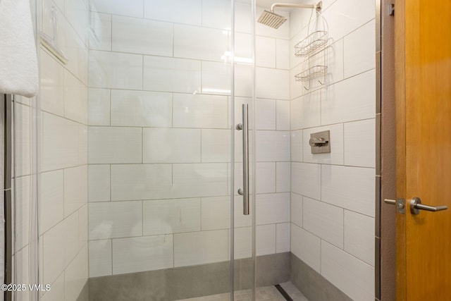 full bathroom with a shower stall