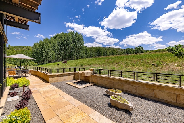 455 Old Creamery Rd, Edwards, CO 81632 - view of patio featuring outdoor dining area and a wooded view