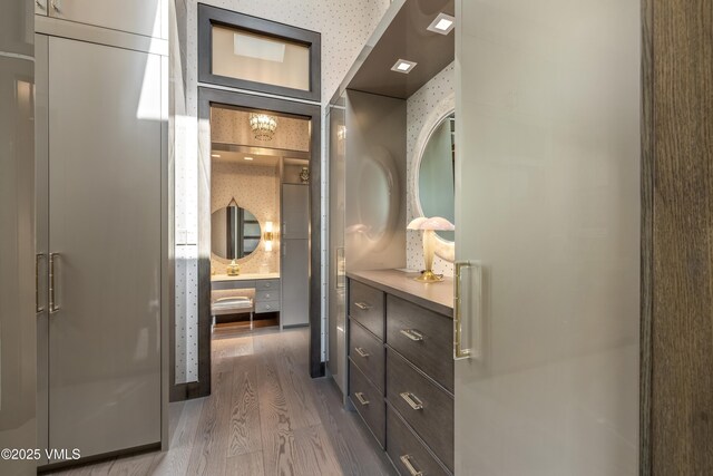455 Old Creamery Rd, Edwards, CO 81632 - bathroom with wood finished floors, vanity, and a shower with door