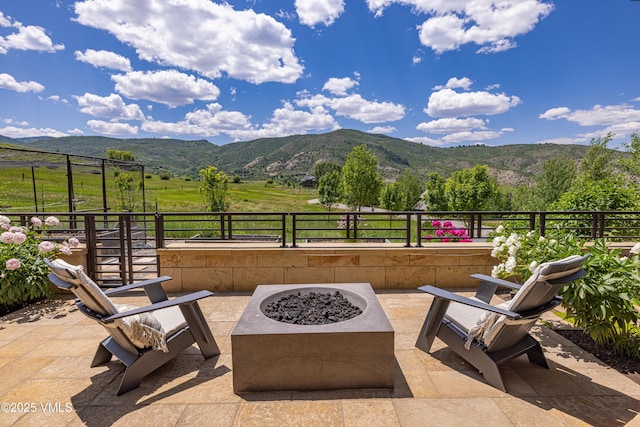 455 Old Creamery Rd, Edwards, CO 81632 - view of patio / terrace featuring an outdoor fire pit and a mountain view