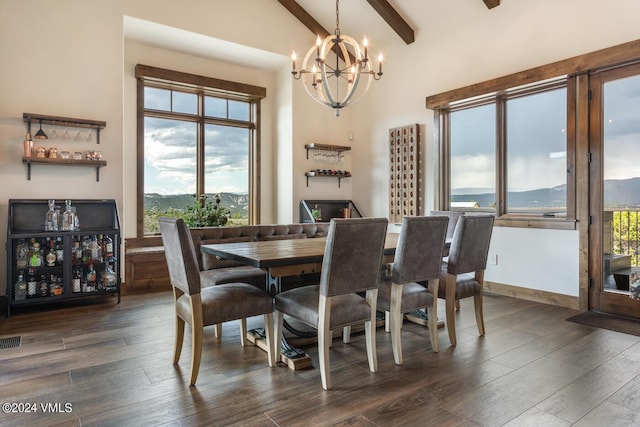 1288 E Haystacker Dr, Eagle, CO 81631 - dining space with a mountain view, beam ceiling, dark hardwood / wood-style floors, and a chandelier