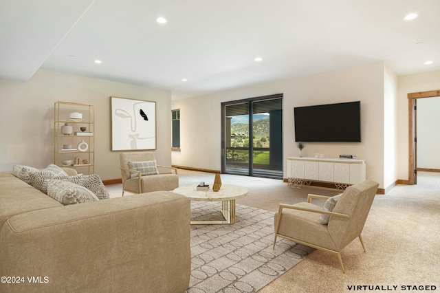 living room featuring light carpet