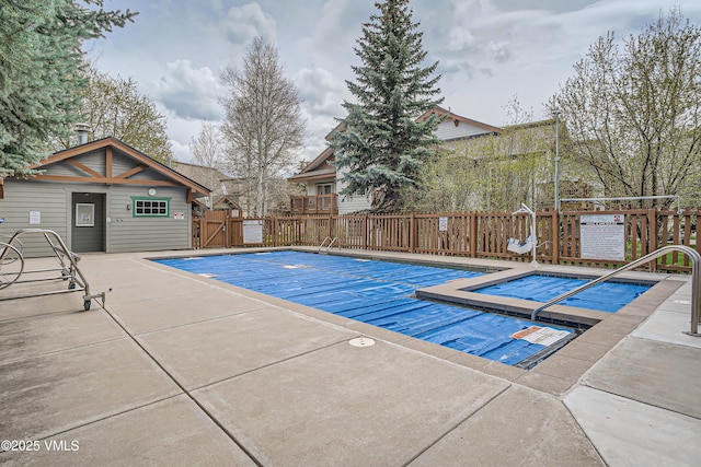 705 Crazy Horse Cir, Edwards, CO 81632 - community pool featuring fence, a gate, and a patio area