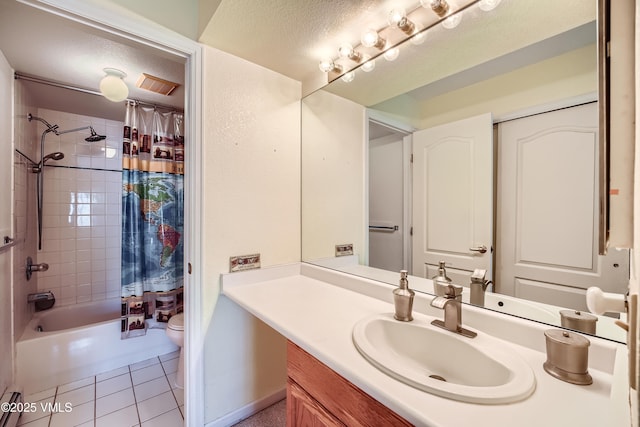705 Crazy Horse Cir, Edwards, CO 81632 - full bath featuring toilet, tile patterned floors, shower / tub combo, vanity, and a textured ceiling