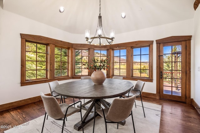 37 Aspen Meadows Rd, Edwards, CO 81632 - dining area featuring a chandelier, baseboards, wood finished floors, recessed lighting, and high vaulted ceiling