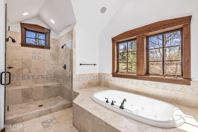 37 Aspen Meadows Rd, Edwards, CO 81632 - full bathroom featuring lofted ceiling, a stall shower, a jetted tub, plenty of natural light, and recessed lighting
