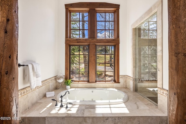 37 Aspen Meadows Rd, Edwards, CO 81632 - full bath with healthy amount of natural light and a tub with jets