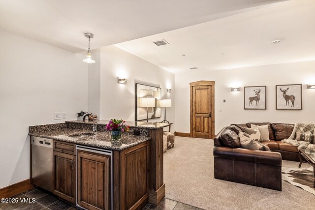 37 Aspen Meadows Rd, Edwards, CO 81632 - living area featuring baseboards and dark carpet
