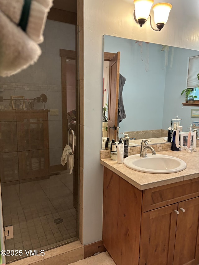 0040 Bunker Way, Eagle, CO 81631 - bathroom featuring vanity and a shower stall