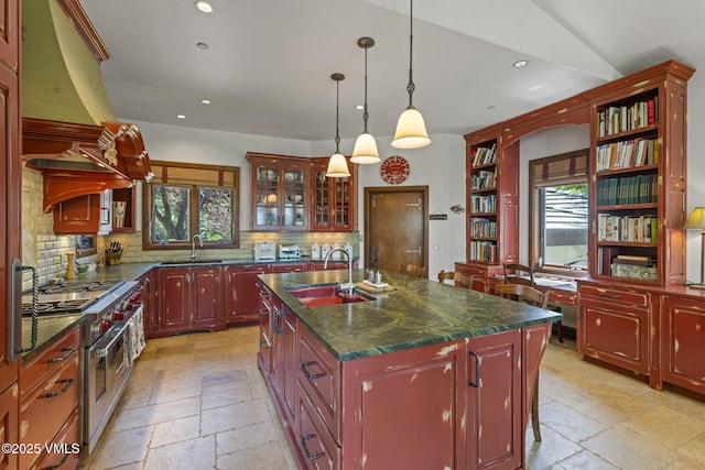 225 Alcazar Dr, Edwards, CO 81632 - kitchen with double oven range, open shelves, stone tile floors, recessed lighting, and tasteful backsplash