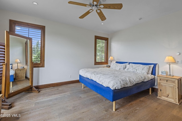 225 Alcazar Dr, Edwards, CO 81632 - bedroom with wood finished floors, recessed lighting, and a ceiling fan