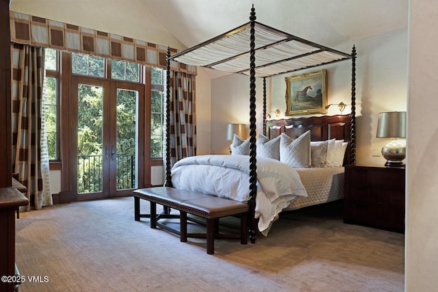 153 Village Walk, Beaver Creek, CO 81620 - carpeted bedroom featuring french doors, lofted ceiling, and access to exterior