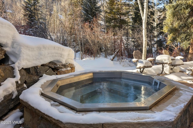 exterior details with a hot tub