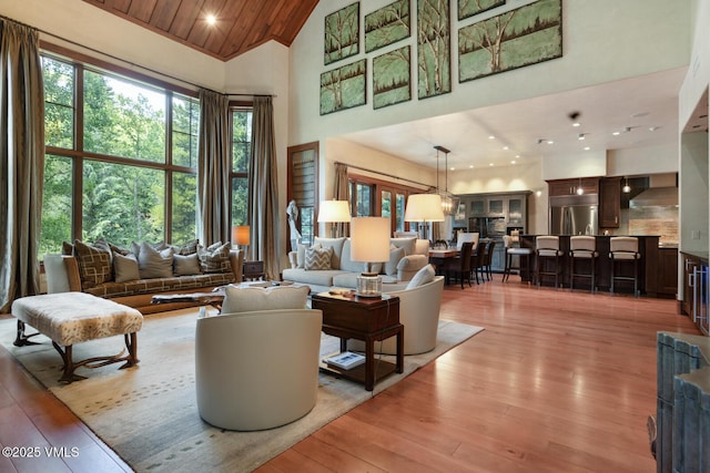 153 Village Walk, Beaver Creek, CO 81620 - living area featuring high vaulted ceiling, light wood-style flooring, recessed lighting, and wood ceiling
