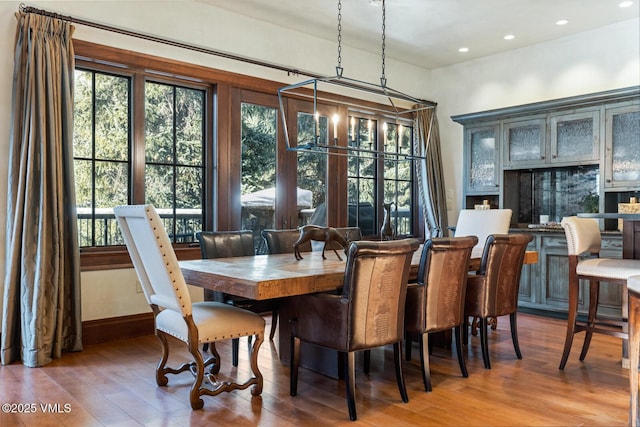 dining room with wood-type flooring