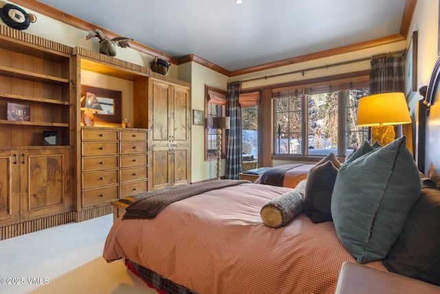 carpeted bedroom featuring ornamental molding