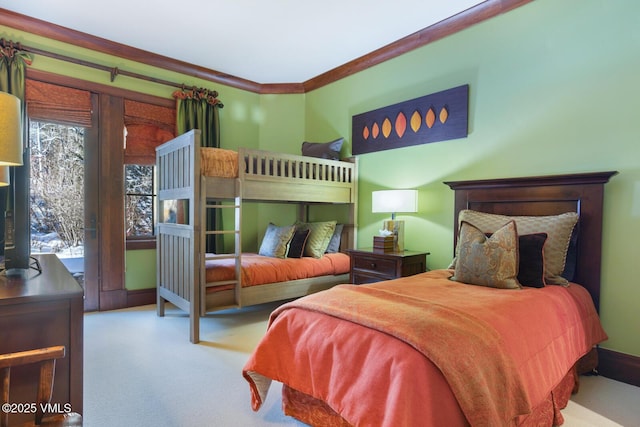 bedroom featuring light carpet, access to outside, and ornamental molding